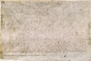 Η Magna Carta του 1215 είναι γραμμένη σε περγαμηνή, στα μεσαιωνικά λατινικά, και επικυρωμένη με τη μεγάλη σφραγίδα του βασιλιά Iωάννη.