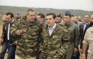 Prime minister Alexis Tsipras with Panos Kammenos, minister of Defence, in military uniforms. 